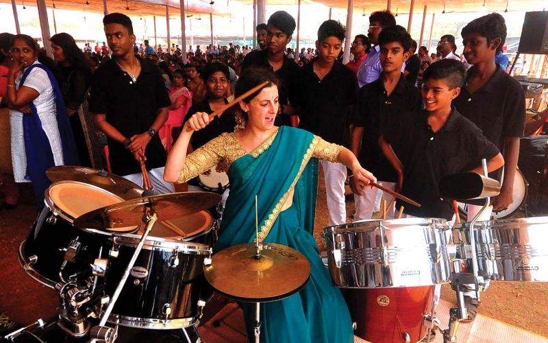 Joanna Caplan, Canadian theatre artist, performs western music orchestra at a Kalolsavam venue. (Photo: DC)