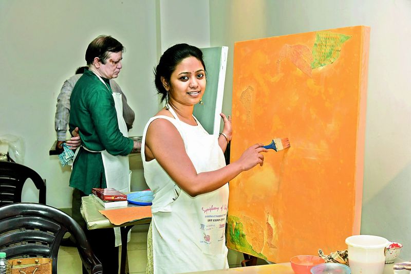 Priyanka Aelay adding hues to her work.