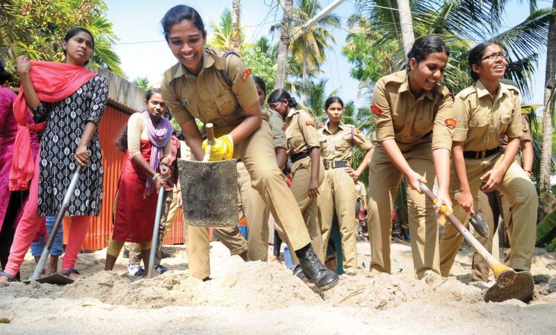 NCC cadets and NSS members of St Teresa's College engaged in relief operations at Chellanam. (Photo: DC)