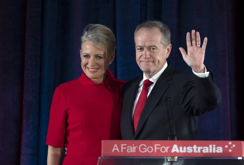 Australian Labor leader Bill Shorten stands on stage with his wife Chloe, at the Federal Labor Reception in Melbourne, Australia, Saturday, May 18, 2019. Shorten has conceded defeat to Prime Minister Scott Morrison in the country's general election. Shorten made the announcement to supporters of his opposition Labor party late Saturday night in Melbourne. (AP Photo/Andy Brownbill) 