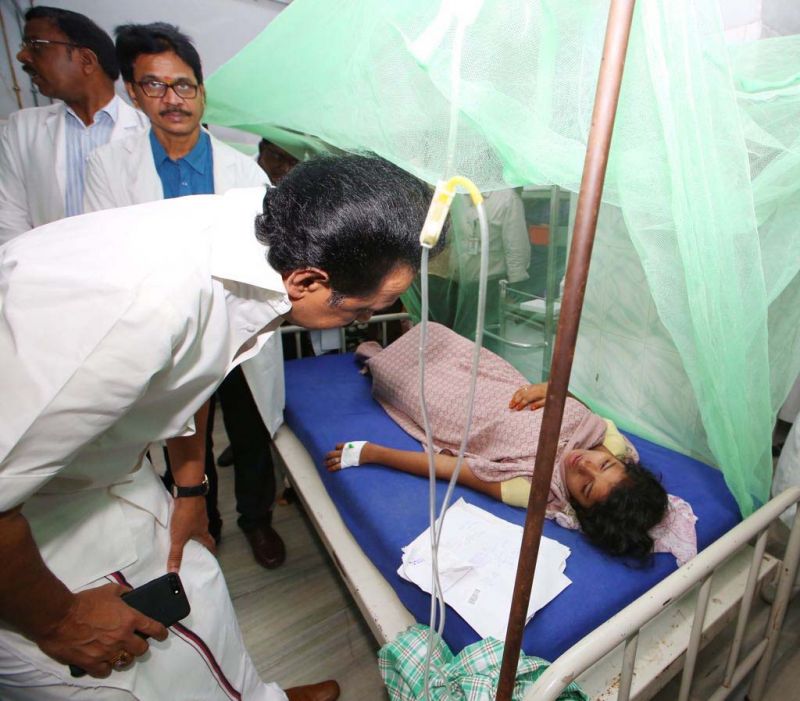 Opposition Leader M.K. Stalin interacts with a dengue patient at Rajiv Gandhi Government General Hospital on Thursday. (Photo: DC)