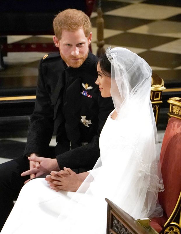 Britain's Prince Harry and Meghan Markle during their wedding at St. George's Chapel in Windsor Castle in Windsor, near London, England, Saturday, May 19, 2018.  (Photo: AP)