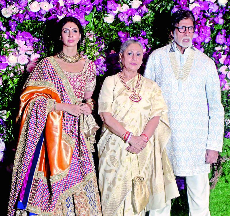 Curiously, the wedding also saw two huge Bollywood icons â€” Amitabh Bachchan and Shah Rukh Khan â€” sporting pearl necklace for the event... something neither have done before.