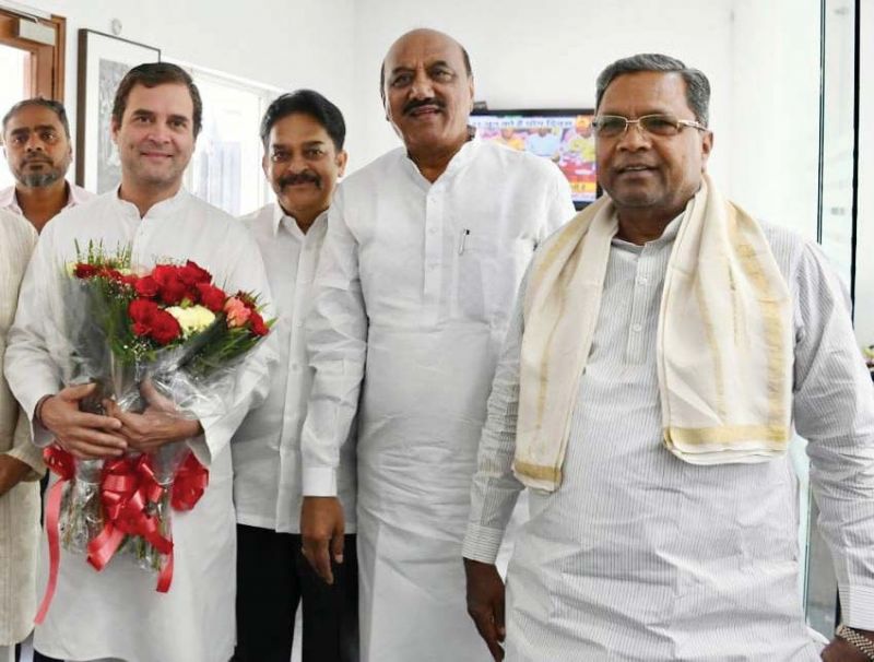 Former CM Siddaramaiah greets AICC President Rahul Gandhi on his birthday in New Delhi on Wednesday. (Inset) Minister D.K. Shivakumar also wished him. (Photo: DC)