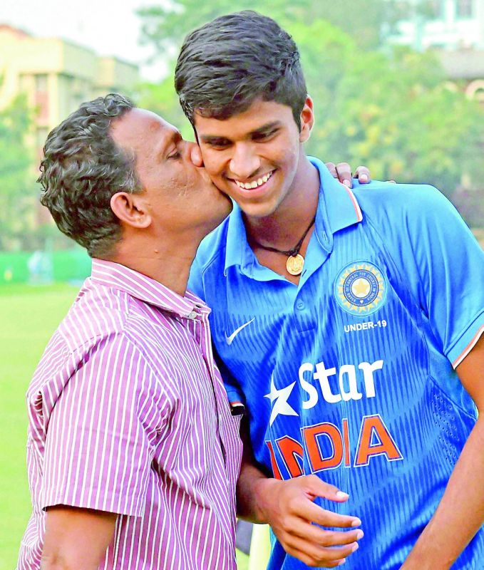 Washington with his father after the win against Bangladesh during U-19 Tri-series Cricket Tournament in Kolkata