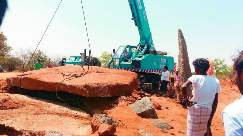The crane from Hyderabad took four hours to lift the 40 ton capstone.