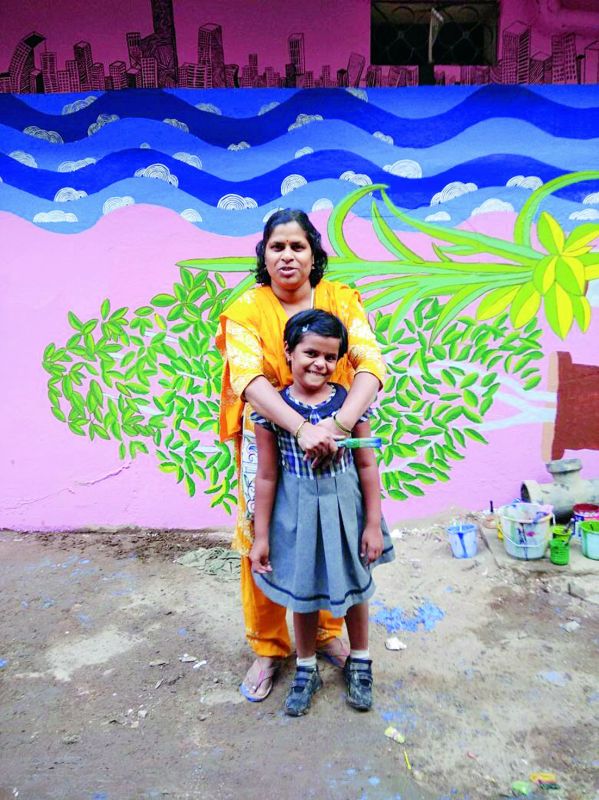 l Artist B. Karuna with a kid