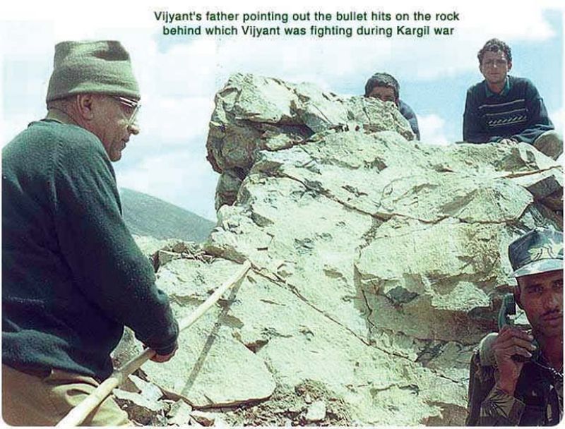 Col.(retd) V.N.Thapar shows the bullet marks on the rocks behind which Vijayant Thapar died during  the Kargil war