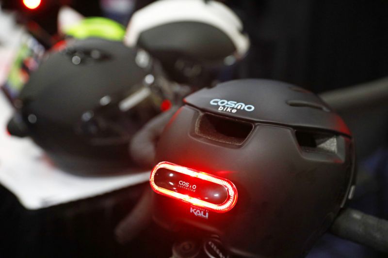 The Cosmo City bike helmut is on display at the Cosmo Connected booth during CES Unveiled at CES International, Sunday, Jan. 6, 2019, in Las Vegas. The smart light and helmut can detect when when the wearer is in an accident and notify emergency contacts via SMS or email. (AP Photo/John Locher)