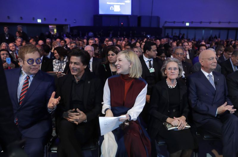 Shah Rukh Khan with British musician Elton John, Australian actress Cate Blanchett, Hilde Schwab, Chairwoman and Co-Founder of the World Economic Forum's World Arts Forum, and WEF founder Klaus Schwab, from left, wait for the ceremony for the Crystal Awards on the eve of annual meeting of the World Economic Forum in Davos. (Photo: AP)