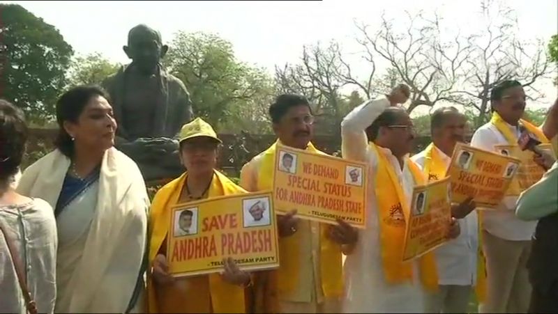TDP MPs protest outside Parliament over special category status to Andhra Pradesh. Congress MP Renuka Chowdhury also joined the protes. (Photo: ANI | Twitter)