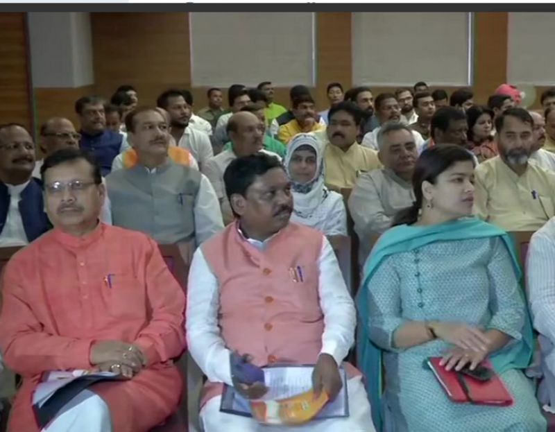 BJP workers and leaders attending the meeting. (Photo: ANI)