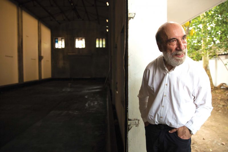 Chilean poet Raul Zurita near his installation