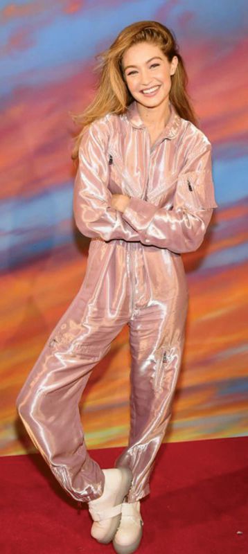 Gigi Hadid in Pink shiny boiler suit