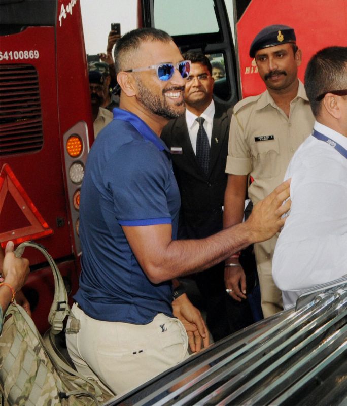 MS Dhoni looks pleased following his arrival in his hometown Ranchi. (Photo: PTI)