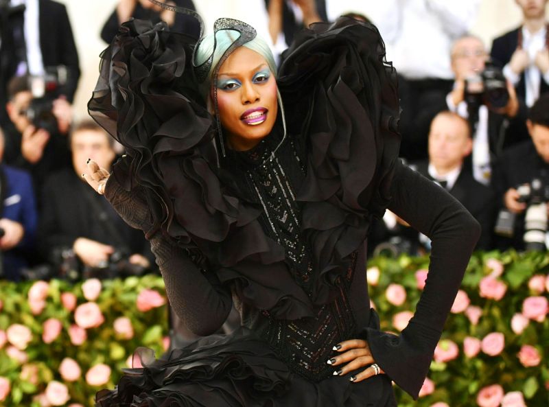 Laverne Cox attended 2019 The Met gala dressed in a striking sculptural gown by Christian Siriano, along with turquoise hair. (Photo: AP)