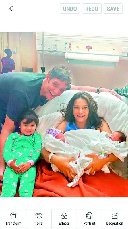 Diana Hayden with her new born babies and her earlier daughter Arya and husband