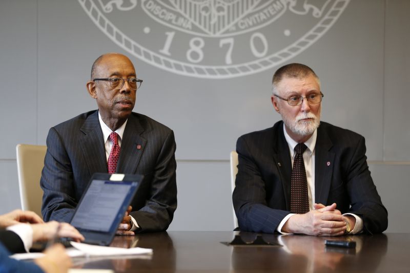 Ohio State University president Michael Drake, left, and provost Bruce McPheron answer questions during an interview about the accusations against former Ohio State team doctor Richard Strauss Friday, May 17, 2019, in Columbus, Ohio. An investigation found that Strauss sexually abused at least 177 athletes from at least 16 sports as well as others from his work at the student health center and his off-campus clinic. (AP Photo/Jay LaPrete) 