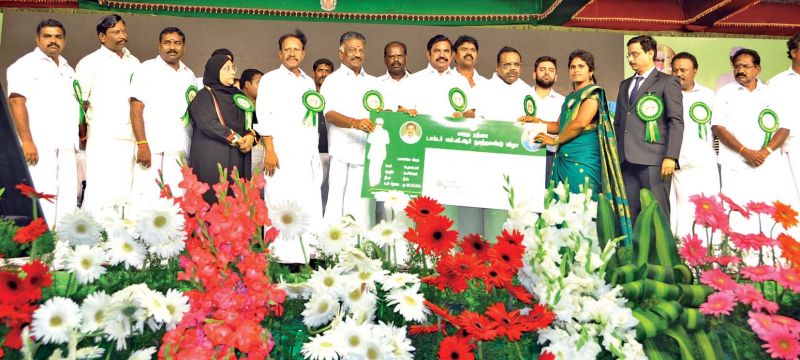 Chief Minister Edappadi Palaniswami and Deputy CM O. Panneerselvam distribute assistance to beneficiaries at MGR centenary celebrations in Vellore  on Saturday (Photo: DC)