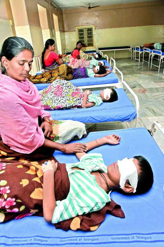 Mothers attend to their children who suffered injuries while celebrating Diwali in Hyderabad on Friday. Many children who suffered eye injuries while bursting crackers were admitted to the  Sarojini Eye Hospital on Friday. (Photo: P.Surendra)