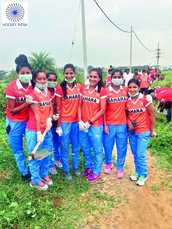 cleanliness is everything: Members of the women's hockey team during the Swachh Bharat Abhiyan campaign in Bengaluru recently.