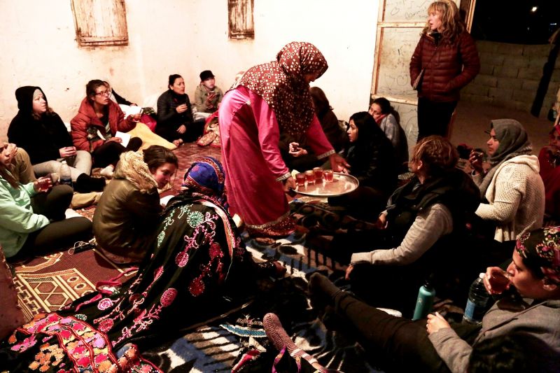 Umm Yasser offers tea to women's only circle of tourists and Bedouin from the Hamada tribe, at her home in Wadi Sahw, South Sinai, Egypt. (Photo: AP)