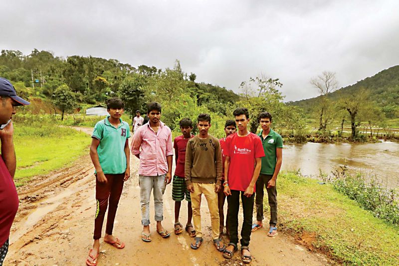 Mahesh (second from left) and his friends saved four women and a child