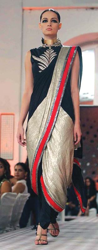 This black, gold and red saree is  perfect for  festivals and weddings.