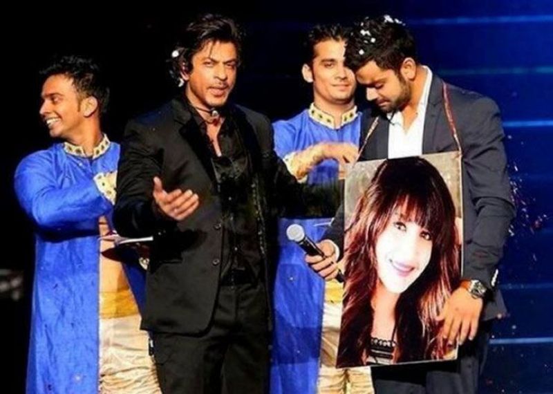 Shah Rukh Khan and Virat Kohli with Anushka Sharma's photo during IPL.