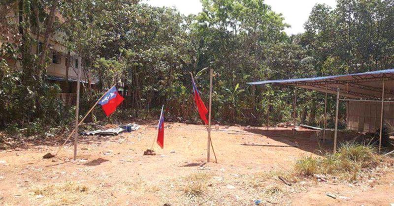 The flags raised by the AIYF at the place where Sugathan planned to start his workshop      - File pic