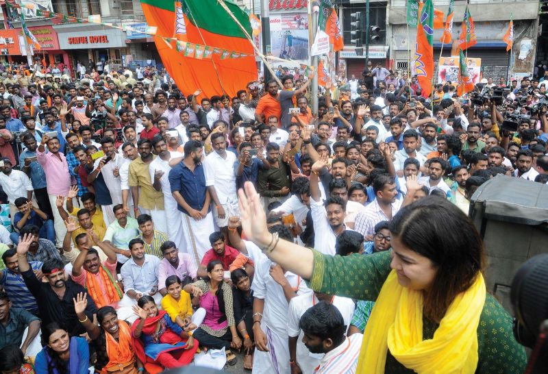 Yuva morcha national president Poonam Mahajan waving to supporters who assembled to lay siege to the Secretariat in Thiruvananthapuram on Thursday against the LDF Government's one year in office.  (Photo: A.V. MUZAFAR)