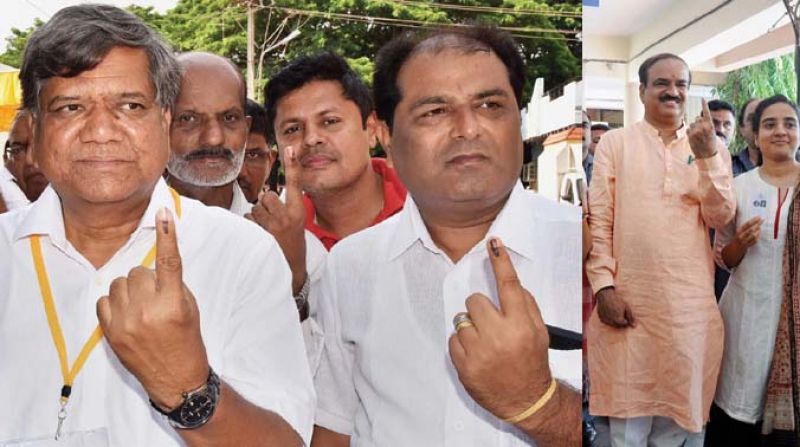 Jagadish Shettar and H.N. Ananth Kumar after casting votes in their respective constituencies on Saturday