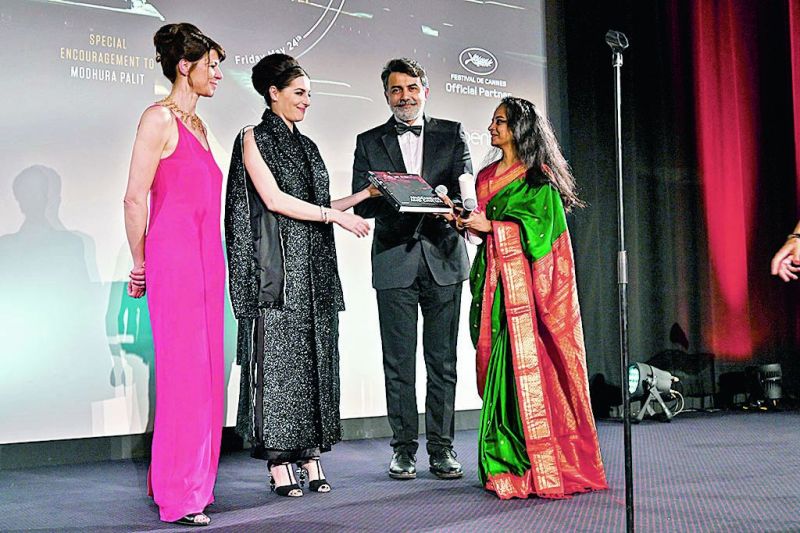 Modhura Palit while receiving award at Cannes Film Festival.