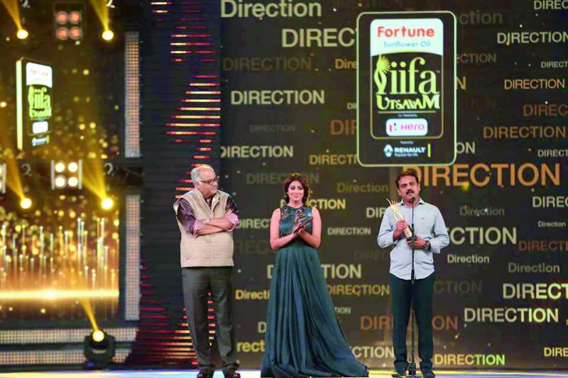  Koratala Siva receives an award for the movie  Janatha Garage