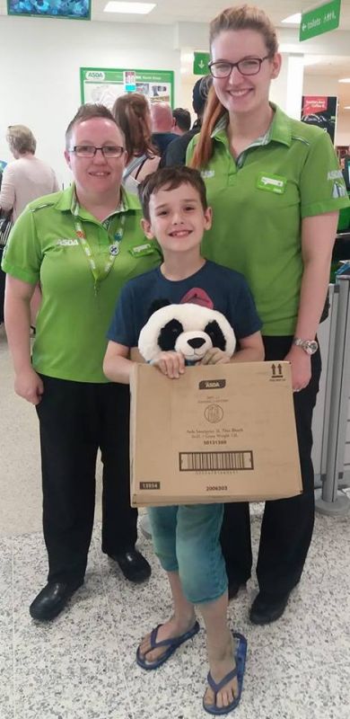 Leon owner with store workers at Asda and his Pandy (Photo: Facebook)