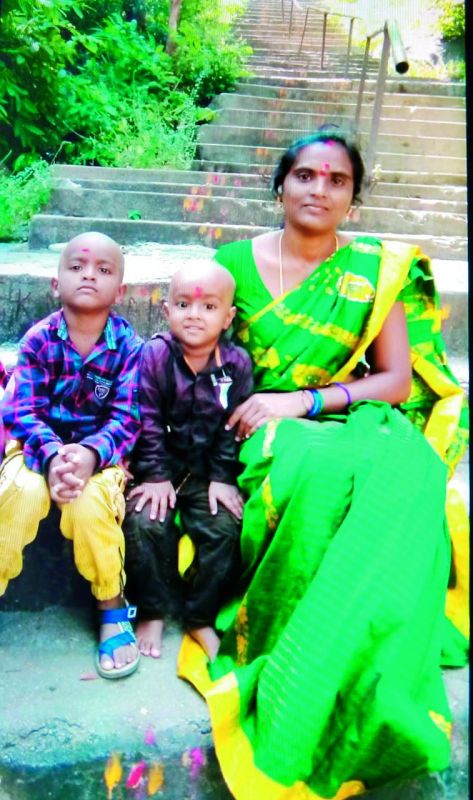C. Saroja with her kids.
