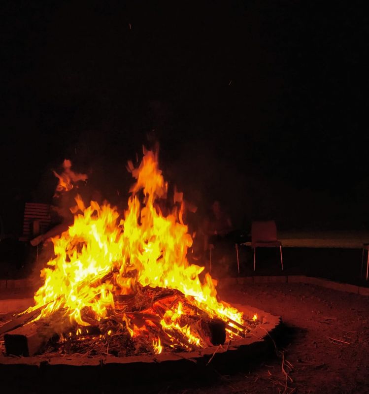 Camp Fire under stars.