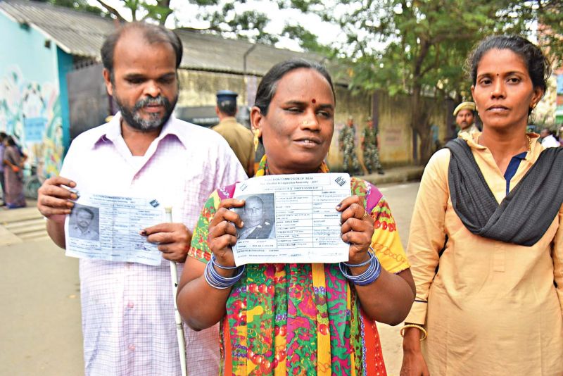 Visually impaired voters after casting their votes at Kamarajar street polling booth, on Thursday. (Photo: DC)