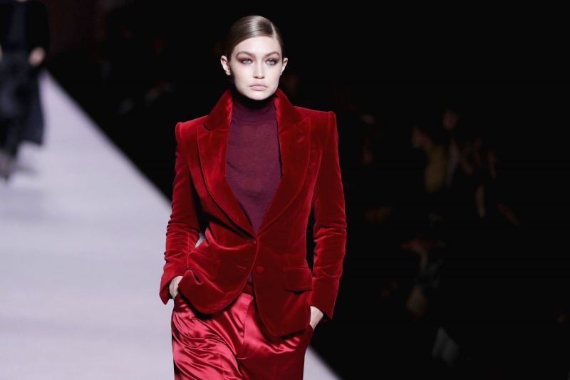 Gigi Hadid in beautiful Burgandy Velvet Pant suit from Tom Ford's collection. (Photo: AP)