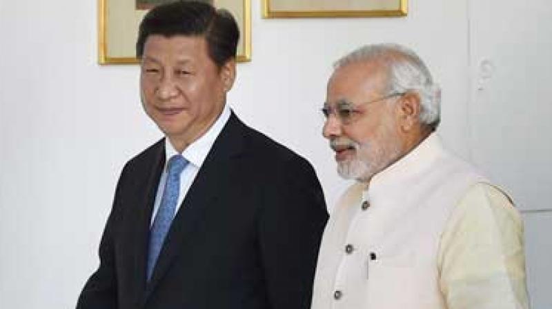 Chinese President Xi Jinping and PM Narendra Modi. (Photo: PTI)