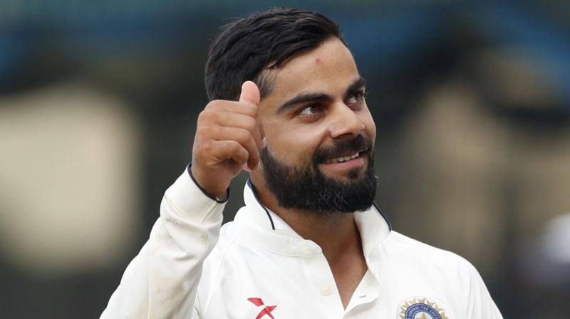Virat Kohli, Indian Test skipper, who amassed 1215 runs in 12 Tests played in 2016 and scored four centuries, including three double hundreds, was named to skipper of the Cricket Australias Test Team of 2016. (Photo: AP)