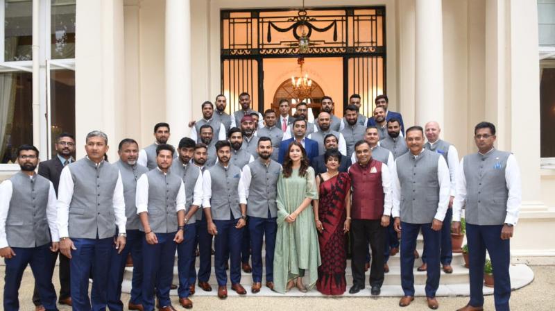 The Twitterati was not pleased as Anushka Sharma stood right in the centre of the photo alongside her husband and Team India skipper Virat Kohli while Indian Test teams vice-captain Ajinkya Rahane stood in the last row. (Photo: Twitter / BCCI)