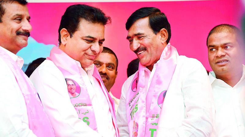 TRS working president K. T. Rama Rao welcomes former Congress leader Vanteru Pratap Reddy to the party at TRS Bhavan on Friday.