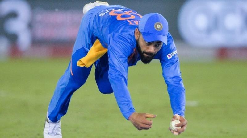 During Indias second T20I match against South Africa, Virat Kohli displayed some stunning athleticism to take a one-handed catch to dismiss South African skipper Quinton De Kock, who was scored a vital 50 to take his side to post a decent total of 150 in the first innings. (Photo:AFP)