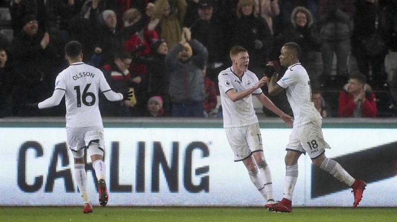 Sam Clucas (centre) helped Swansea completes remarkable back-to-back victories for Swansea, who have transformed their season with three wins in five league games under new boss Carlos Carvalhal. (Photo: Twitter))