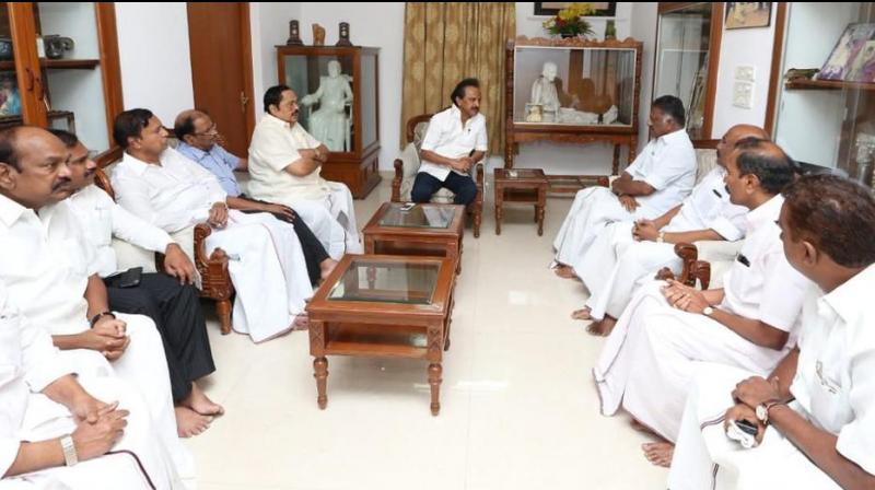 Deputy CM O Panneerselvam along with other ministers met DMKs MK Stalin to inquire about DMK chief M Karunanidhis at latters residence in Chennai. (Photo: ANI/Twitter)