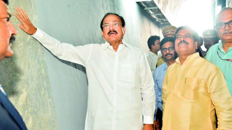 Vice President M. Venkaiah Naidu along minister of state for railways Suresh Angadi is seen inspecting the longest tunnel near Cherlapalli in Kadapa district on Saturday.