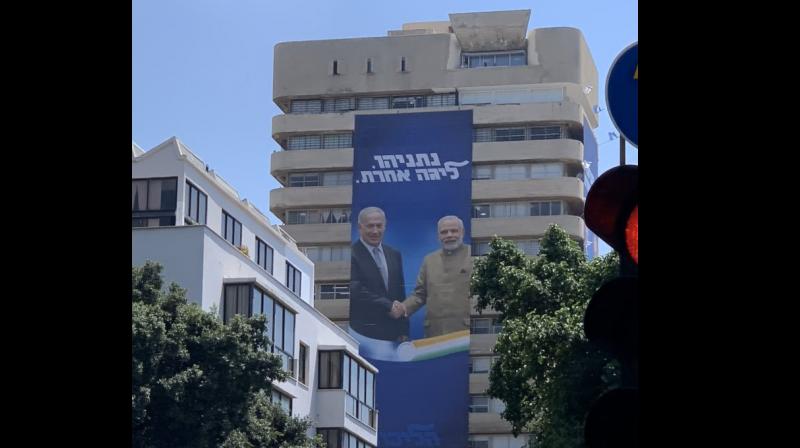 Election advertisement banner featuring Netanyahu, Modi spotted in Israel