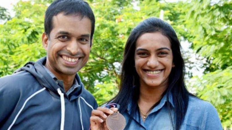 PV Sindhu, coached by Pullela Gopichand, became the first Indian shuttler to win a Silver at the Olympics. (Photo: AFP)