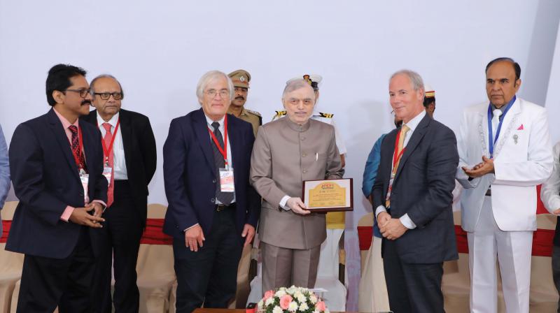 Governor P. Sathasivam displays a memento presented to him by the visiting faculty at the inauguration of the sixth JPEF global diabetes convention, organised by Kesavadev Trust in Thiruvananthapuram. Dr Jothydev, Dr Shaukat Sadiko, Dr John Pickup (UK), Dr Robert Vigersky (USA) and Dr Muruganathan look on.